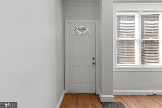 doorway to outside with light hardwood / wood-style floors