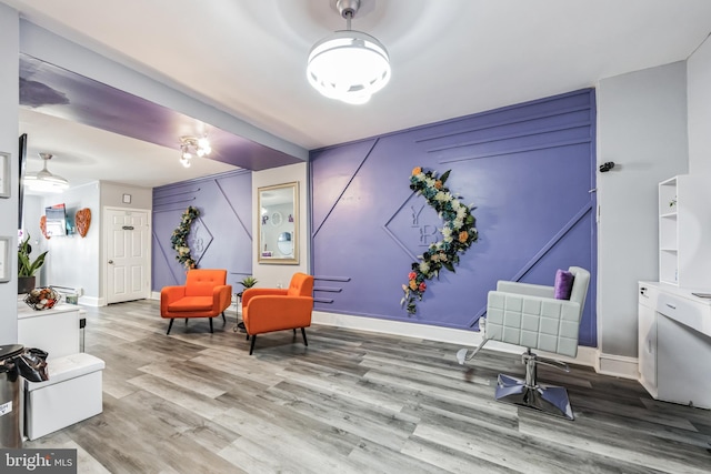 living area featuring hardwood / wood-style flooring