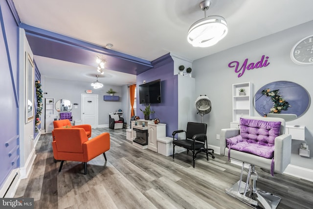 interior space featuring hardwood / wood-style flooring and baseboard heating