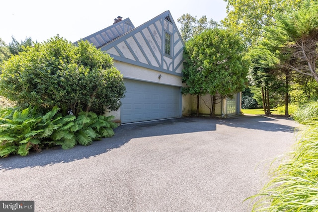 exterior space with a garage