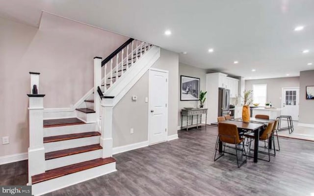 dining room featuring dark hardwood / wood-style flooring