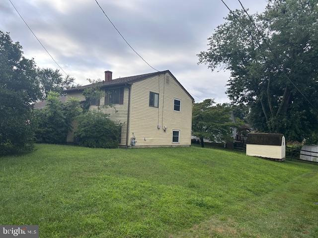 view of home's exterior featuring a yard