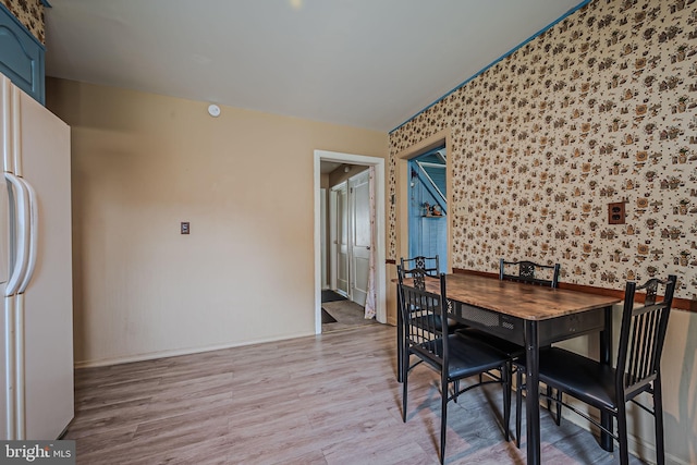 dining room featuring light hardwood / wood-style floors