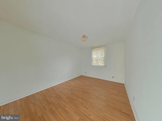 unfurnished room featuring light hardwood / wood-style flooring