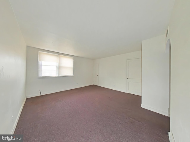 view of carpeted spare room