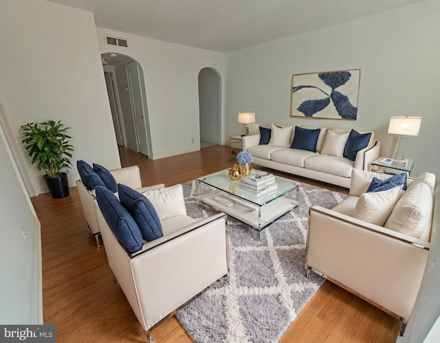 living room with hardwood / wood-style flooring