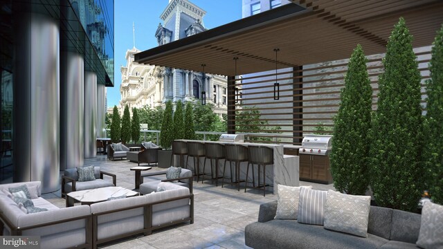 view of patio / terrace with an outdoor hangout area and exterior bar