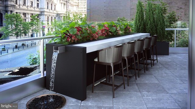 balcony with an outdoor fire pit