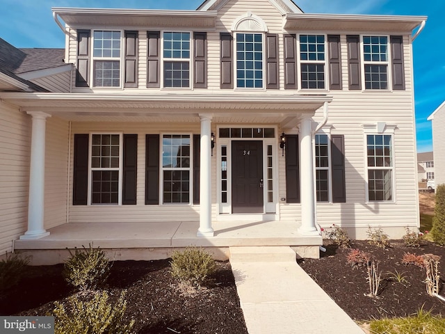 view of front of home featuring covered porch