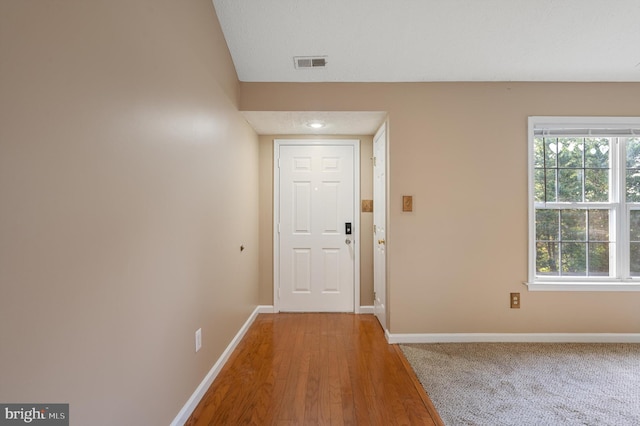 entrance foyer with hardwood / wood-style flooring