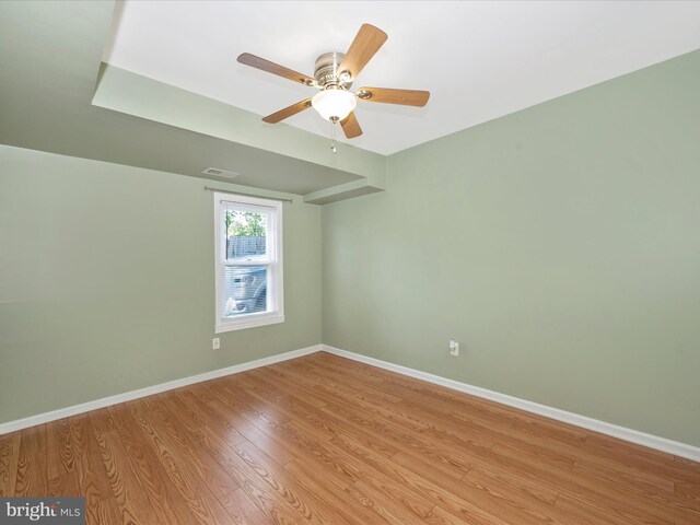 unfurnished room with ceiling fan and light hardwood / wood-style flooring