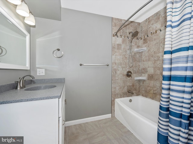 bathroom with shower / tub combo with curtain and vanity