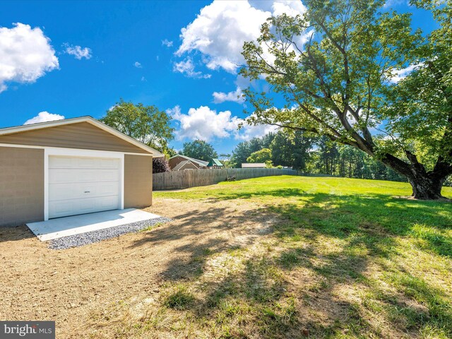 view of yard featuring a garage