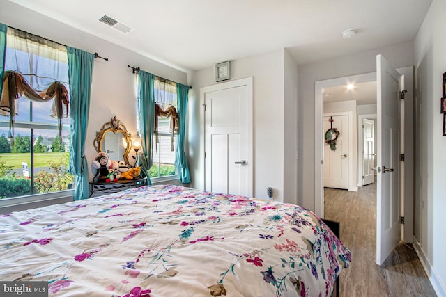 bedroom featuring hardwood / wood-style flooring