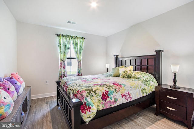 bedroom with light wood-type flooring