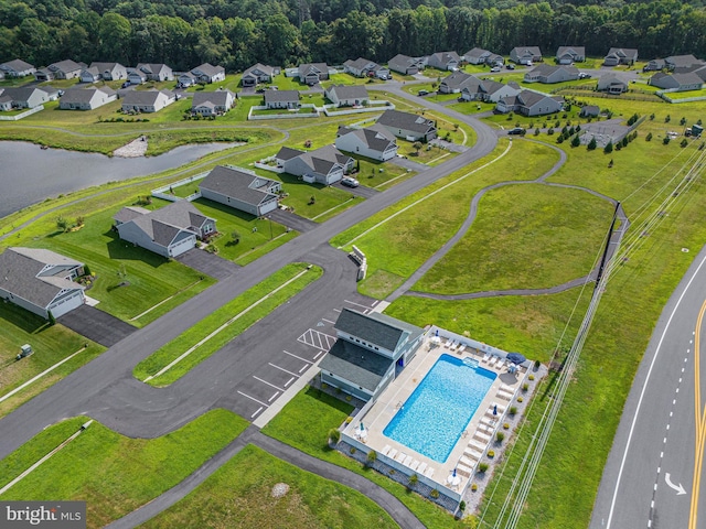 birds eye view of property with a residential view