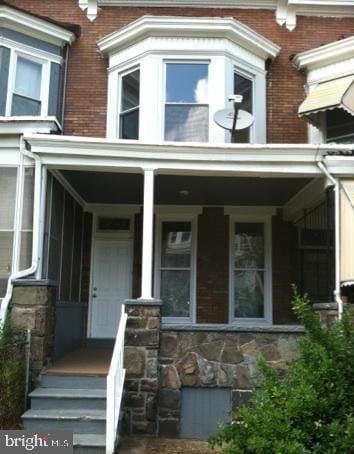 property entrance with a porch