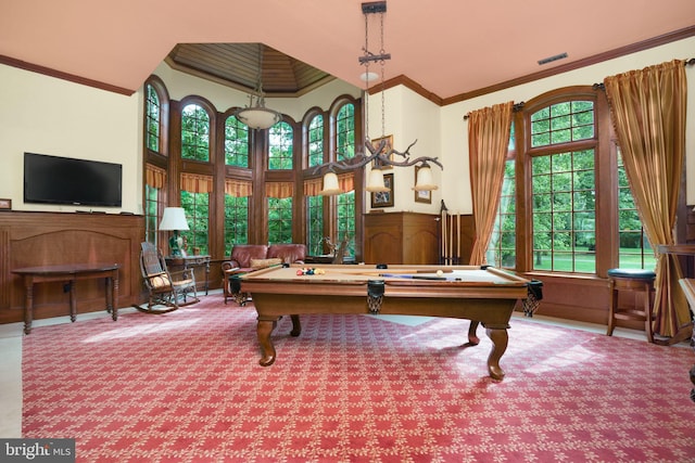 game room featuring ornamental molding, carpet, wainscoting, and visible vents