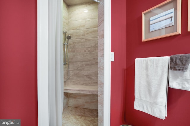 bathroom featuring a stall shower