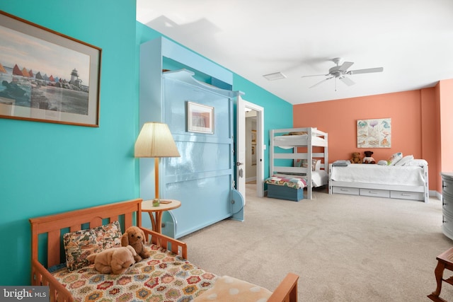 bedroom with carpet and a ceiling fan