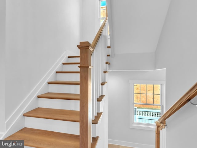 staircase with plenty of natural light