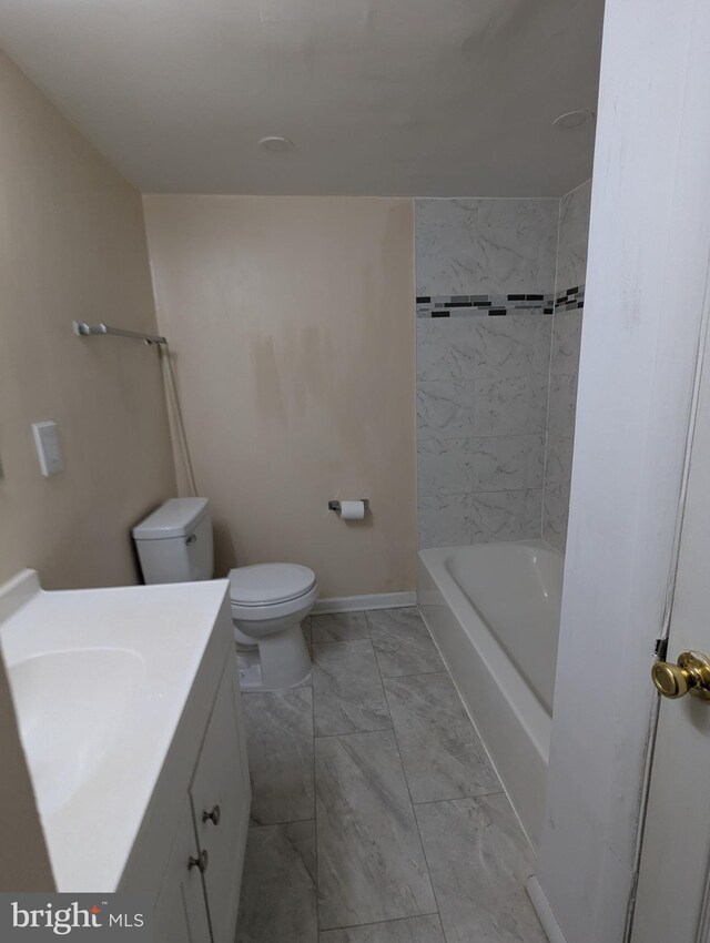 bathroom featuring tiled shower / bath combo and tile patterned floors