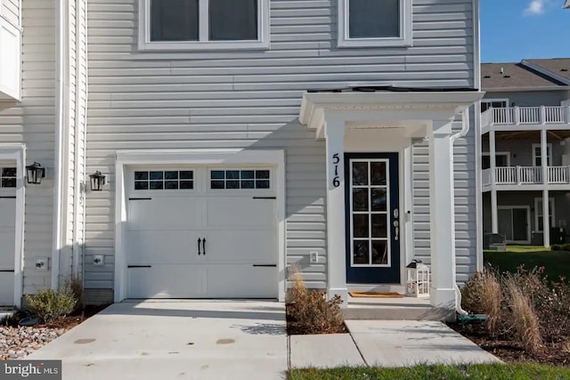 entrance to property featuring a garage