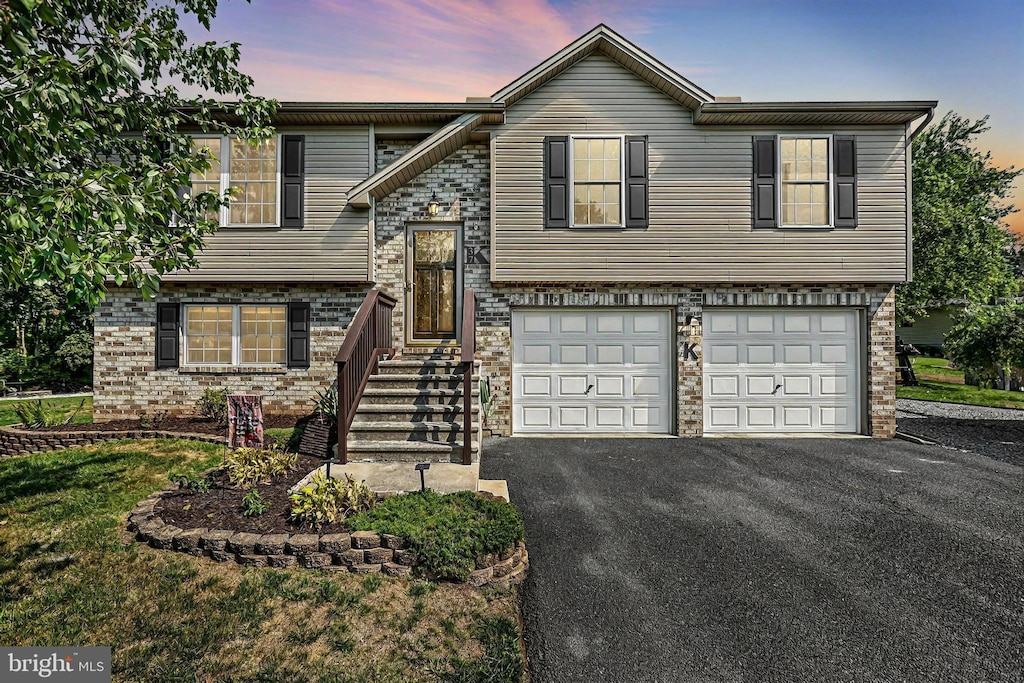 raised ranch with a garage