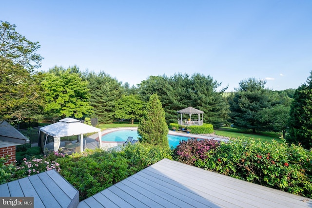 wooden deck featuring a gazebo