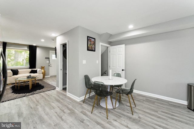 dining room featuring wood-type flooring