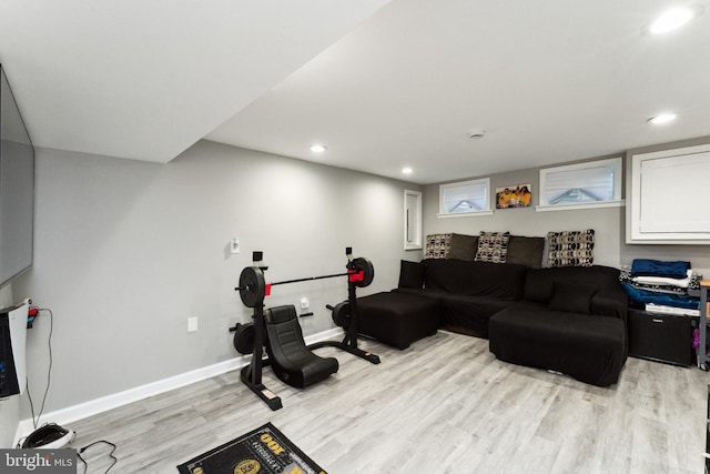 exercise area with light wood-type flooring