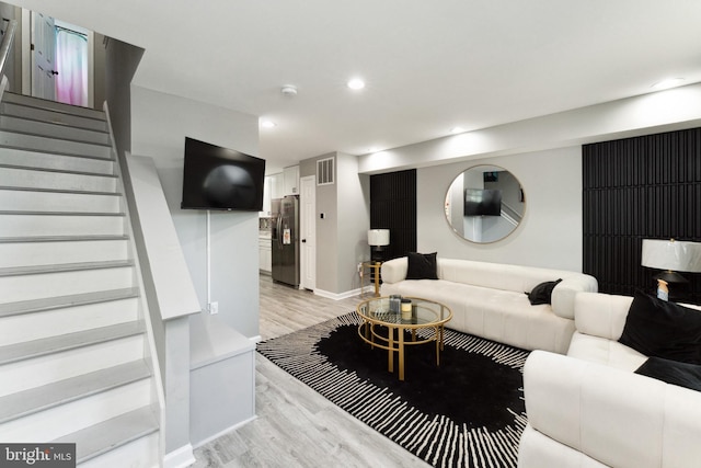 living room featuring light wood-type flooring