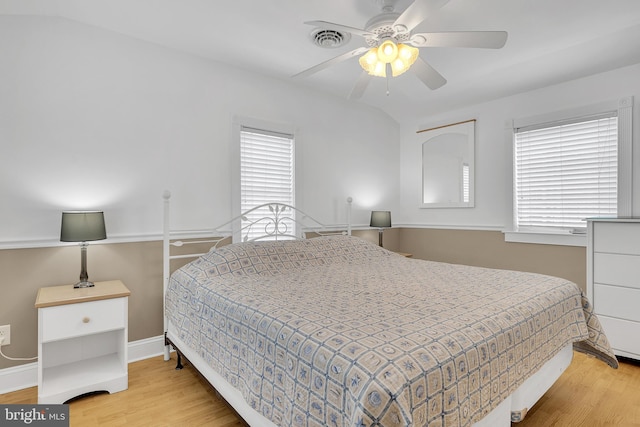 bedroom featuring ceiling fan and light hardwood / wood-style floors