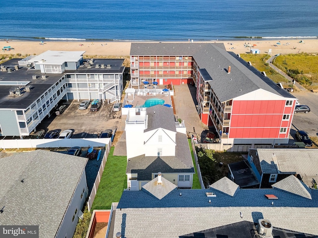 aerial view with a beach view and a water view