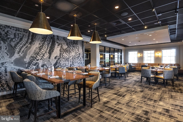 dining space featuring carpet flooring and visible vents