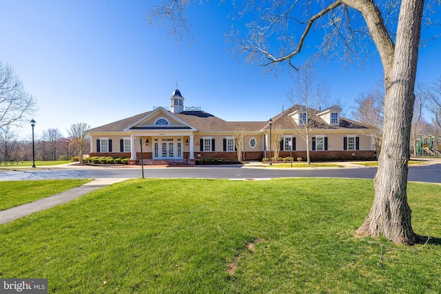 view of building exterior with driveway