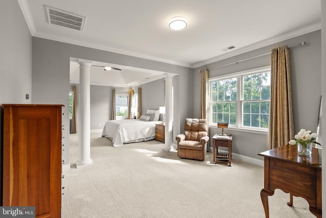 bedroom featuring crown molding, visible vents, ornate columns, and carpet floors