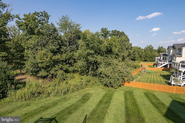 view of yard featuring fence