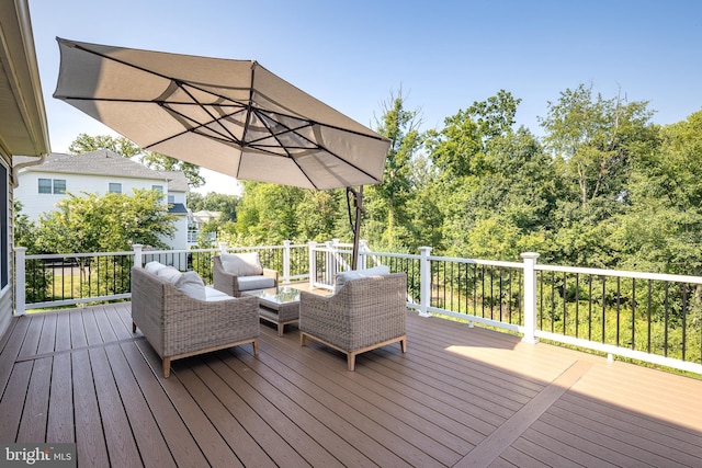 wooden deck with outdoor lounge area