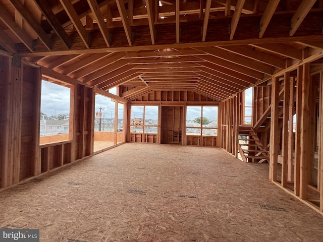 misc room featuring lofted ceiling