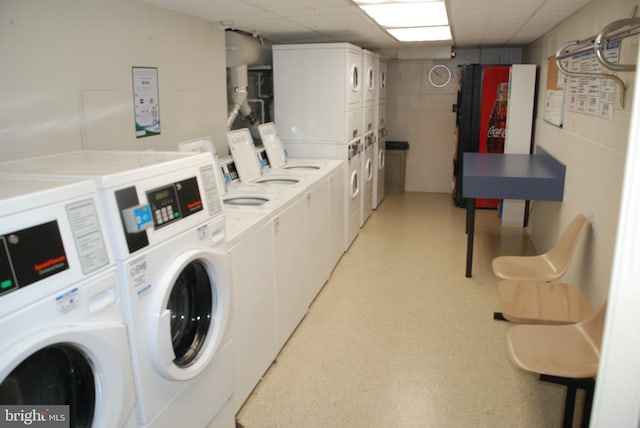 washroom featuring stacked washer / drying machine and washing machine and dryer