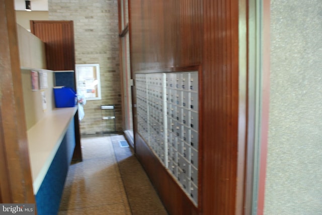 interior space featuring a mail area