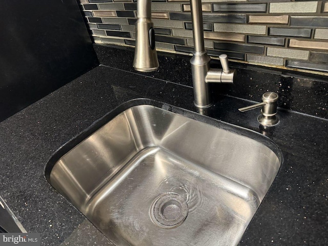 details with tasteful backsplash and sink