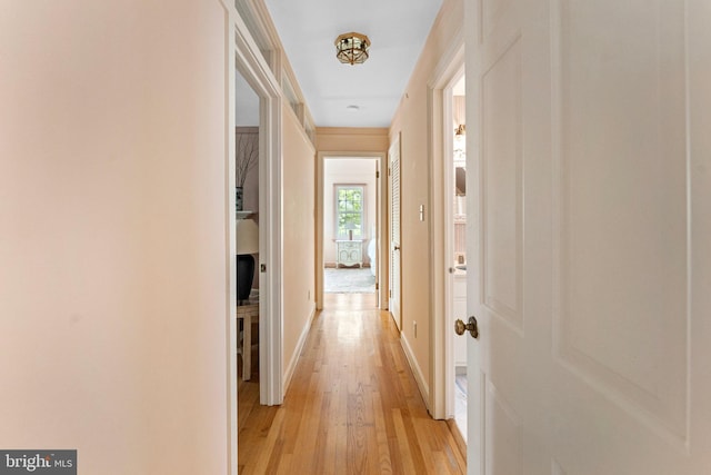 hallway featuring light wood-type flooring