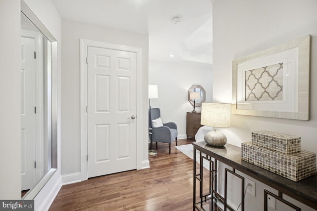 hallway featuring hardwood / wood-style flooring