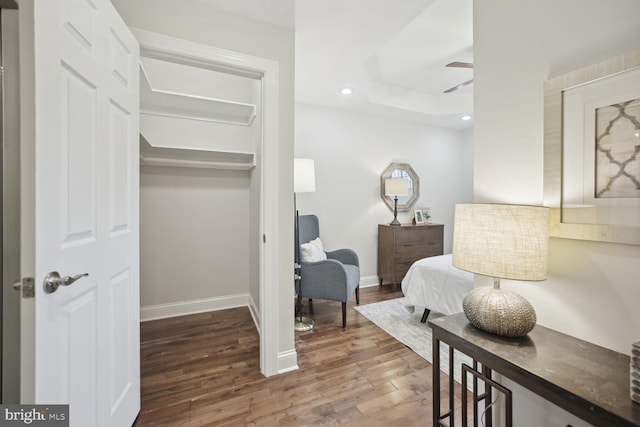 bedroom with hardwood / wood-style floors