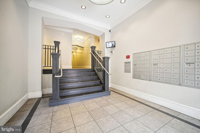 stairway with tile patterned flooring and crown molding