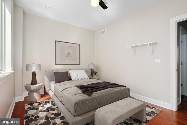 bedroom with dark wood finished floors, recessed lighting, visible vents, a ceiling fan, and baseboards