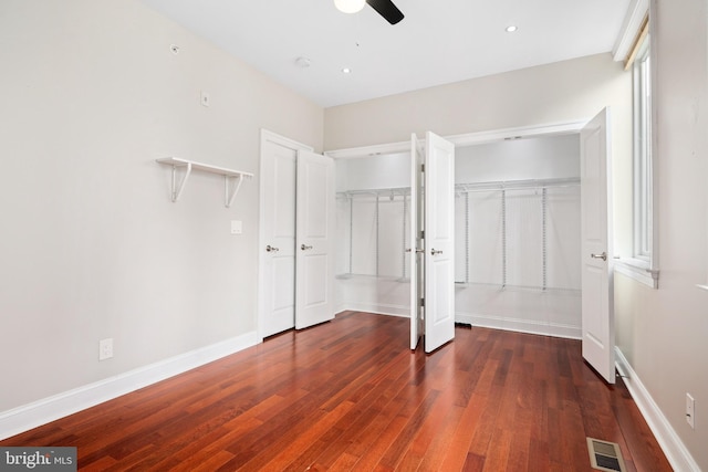 unfurnished bedroom featuring dark wood finished floors, recessed lighting, visible vents, a ceiling fan, and baseboards