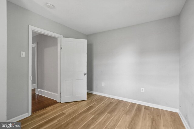 unfurnished bedroom featuring wood-type flooring